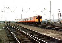 SPT liveried 314209 passing through Mossend Yard in July 1996 heading for Motherwell.<br><br>[John Furnevel 01/07/1996]