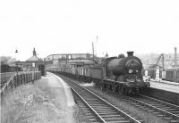 J37 0-6-0 64594 passing through Airdrie with an eastbound coal train on 26 August 1958.  <br><br>[G H Robin collection by courtesy of the Mitchell Library, Glasgow 26/08/1958]