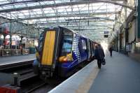 The 14.30 service to Ayr waits at Glasgow Central platform 15 on 8 January.<br><br>[Colin Miller 08/01/2015]