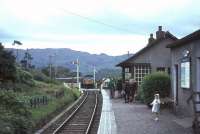 D5349 about to enter Morar station on 17 August 1965 with a train for Mallaig. Note the signal box, lower quadrant signals and level crossing gates. [See image 34896] <br><br>[John Robin 17/08/1965]