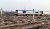 GBRf 66736 <I>'Wolverhampton Wanderers'</I> passing west through Didcot on 22 January 2015. The freight, which would appear to be a new flow, is about to turn north towards Oxford.<br><br>[Peter Todd //]