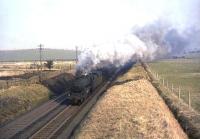Black 5 45235 climbing to Polquhap Summit south of Cumnock on 2 April 1965 with a parcels train. <br><br>[John Robin 02/04/1965]