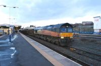 Colas 66849 <I>'Wylam Dilly'</I> passes Blackburn with the Carlisle New Yard to Chirk Kronospan log train on 31 January 2015.<br><br>[John McIntyre 31/01/2015]