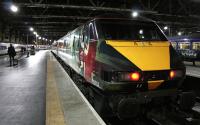 East Coast electric locomotive 91111 <I>'For the Fallen'</I> at Glasgow Central on 10 February 2015 bringing up the rear of the 0650 service to London King's Cross. <br><br>[Colin McDonald 10/02/2015]