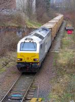 Grey liveried 67015 nearing its destination at Powderhall depot on 12 February 2015 with the returning empty 'bins' from Oxwellmains.<br><br>[Bill Roberton 12/02/2015]