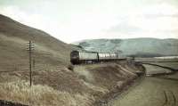 Brush Type 4 D1853 with a WCML train north of Crawford on 25 March 1966.<br><br>[John Robin 25/03/1966]