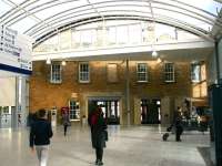Part of the attractive concourse at Haymarket in February 2015, with the refurbished west wall of the original 1842 Edinburgh and Glasgow Railway building neatly incorporated within the new structure. [See image 6956]<br><br>[John Furnevel 18/02/2015]