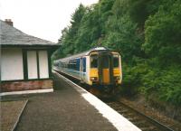 In June 1998 the morning Oban service waits to to pass the southbound train at Arrochar. Although into the privatisation era the Regional Railways livery was still to be seen for a while yet, though the double arrows were removed. <br><br>[David Panton /06/1968]
