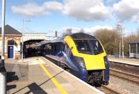 Platform scene at Moreton-in-Marsh on 27 February with First Great Western 180106 running north into the station on a service to Hereford.<br><br>[Peter Todd 27/02/2015]