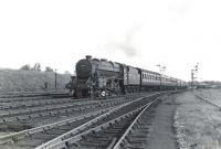 Dalry Road Black 5 44994 pulling away from the Kilwinning stop on 4 July 1959 on its way home with an Ayr - Edinburgh Princes Street train.  <br><br>[G H Robin collection by courtesy of the Mitchell Library, Glasgow 04/07/1959]