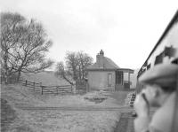 <I>Scottish Rambler no 3</I> passing Haywood station (1868-1951) on the Wilsontown Branch, South Lanarkshire, on 29 March 1964, the year the branch closed completely. <I>Crab</I> 2-6-0 42737 propelled the special along the branch on this section of the tour. [Ref query 6664]<br><br>[John Robin 29/03/1964]