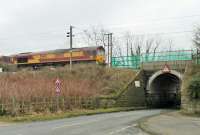 DBS 66140 rumbles slowly over a temporary speed restriction following track relaying at Garstang and Catterall. The train is a coal empties service from Fiddlers Ferry to Hunterston.  <br><br>[Mark Bartlett 05/03/2015]