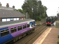 Royal Scot 46115 <I>Scots Guardsman</I> about to run south through Dalston on 14 March 2015 with the returning <I>'Cumbrian Coast Express'</I>, as a Carlisle bound DMU prepares to depart from platform 2. <br><br>[Brian Smith 14/03/2015]