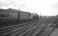 A1 60118 Archibald Sturrock heads south out of Carlisle on 24 August 1963 after taking over the Summer Saturday 1.57pm Gourock - Birmingham New Street. The Neville Hill Pacific will take the train as far as Leeds City. [See image 42833]<br><br>[K A Gray 24/08/1963]