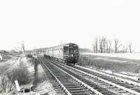 A Neilston High - Glasgow Central DMU drops down from Patterton towards Whitecraigs on 2 December 1960. <br><br>[G H Robin collection by courtesy of the Mitchell Library, Glasgow 02/12/1960]