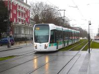 At Cite Universitaire there is interchange between RER line B and RATP tram route T3A. Alstom Citadis 402 tram 313 is running down towards the eastbound tram stop on 25 February en route from Pont du Garigliano to the end to end connection with line T3B at Porte de Vincennes.<br><br>[David Pesterfield 25/02/2015]