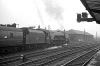 An up troop train photographed at Carlisle on 30 May 1964. The 10 coach 1X68 special is hauled by Stanier Pacific 46250 <I>City of Lichfield</I>. [Some (unconfirmed) sources suggest the train ran from Wemyss Bay to Euston.] This is one of at least two such specials that passed through Carlisle that day [see image 45618]. <br><br>[K A Gray 30/05/1964]