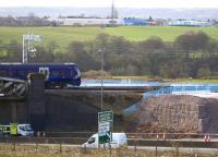 The close proximity of the new M8 extension railway viaduct works to the Cutty Sark bridge. View south from Bargeddie village on 23rd March 2015.<br><br>[Colin McDonald 23/03/2015]