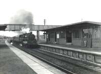 Delivered new from Doncaster Works to Parkhead shed the previous year,  BR Standard class 4 2-6-0 76103 is about to run through Drumry station on 16 September 1958 with a Singer workmen's train. <br><br>[G H Robin collection by courtesy of the Mitchell Library, Glasgow 16/09/1958]