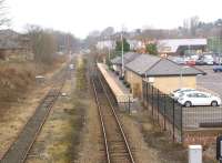 Looking west from Newgate Street bridge, Bishop Auckland on 17 March 2015. The present day single platform station is in the foreground with the Weardale Railway Bishop Auckland West station in the background. The once extensive railway facilities here have long gone with the land reclaimed for retail, car parking and a new road.<br><br>[John McIntyre 17/03/2015]