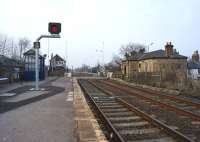 Looking north over the level crossing at Heighington on 18 March 2015. This station is on the route of the Stockton & Darlington Railway and opened for passengers on the same day that line was opened in September 1825. The building on the right is named 'The Locomotion No.1'.<br><br>[John McIntyre 18/03/2015]