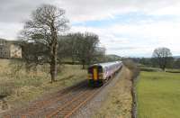 The 1449 Leeds to Carlisle service has just left Settle and is approaching the footbridge at Langcliffe on Easter Saturday 2015. 153330 is leading 158908 as they head for the next stop at Horton-in-Ribblesdale.<br><br>[Mark Bartlett 04/04/2015]