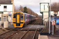 Northern 158756 heads east at Bamber Bridge on 31 January with a Blackpool North to York service.<br><br>[John McIntyre 31/01/2015]