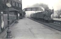 Gresley N2 0-6-2T 69563 arrives at Partickhill on 28 March 1957 at the head of a Hyndland to Easterhouse train. [See image 29517] <br><br>[G H Robin collection by courtesy of the Mitchell Library, Glasgow 28/03/1957]