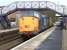 DRS 37601 leads a Network Rail test train through North Queensferry station on 24 February 2015.  Sister locomotive 37610 is bringing up the rear.<br><br>[Bill Roberton 24/02/2015]