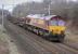 DBS 66199 approaching Fiddlers Gill after passing Braidwood on 19 March with the Dalzell - Tees empty steel train.<br><br>[Bill Roberton 19/03/2015]