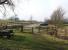 Looking north-west over the site of Mickleton station on the former Middleton-in-Teesdale branch on 19 March 2015. The station was where the cars are parked with the track running along the left side of the car park. [Ref query 4442]<br><br>[John McIntyre 19/03/2015]