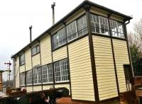 In keeping with the modern trend for signallers to be located remotely from the signals they control, Exeter West box is now located in Crewe. It also has the largest ground floor windows I have ever seen on a signal box, and looks much nicer than the concrete box on the same site [see image 20362].<br><br>[Ken Strachan 03/04/2015]