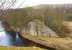 Looking north-west across the River Wear towards Frosterley on 15 March 2015, showing the bridge abutment of a line that left the Wear Valley Railway and climbed up to one of the many quarries in the area.<br><br>[John McIntyre 15/03/2015]