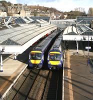 The 0841 Glasgow Queen Street Aberdeen meets the 0903 Dunblane Edinburgh at Stirling on 1 April 2015, day 1 of Abellio ScotRail operations. Not the best start date perhaps...<br><br>[John Furnevel 01/04/2015]