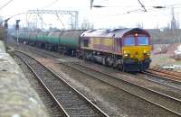 DBS 66221 passes Coatbridge Central on 17 March 2015 with the 6S36 Dalston - Grangemouth empty tanks.<br><br>[Bill Roberton 17/03/2015]