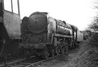 Apart from the removal of all rods, No 35005 <I>Canadian Pacific</I> was still in reasonably complete condition when photographed in Woodham's yard at Barry on March 14 1970. For company, it has Standard Class 5 4-6-0 No. 73096, one of the locos whose tender was sold by Woodham's for conversion to an ingot carrier at the Briton Ferry steel works. At the rear is an ex-GWR Castle, probably No. 5043 <I>Earl of Mount Edgcumbe</I>. [See image 18430]<br><br>[Bill Jamieson 14/03/1970]