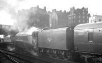 A late April afternoon at Carlisle in 1965 sees A4 Pacific 60031 <I>Golden Plover</I> preparing to take out <I>'Scottish Rambler No 4'</I> on its return to Glasgow. The special had arrived earlier from Queen Street via Edinburgh and Hawick and was preparing to return north on the WCML to Glasgow Central.<br><br>[K A Gray 18/04/1965]