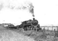 BR Standard class 4 2-6-0 76108 leaving Brucklay with an up passenger train on 16 May 1959. <br><br>[G H Robin collection by courtesy of the Mitchell Library, Glasgow 16/05/1959]