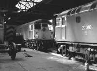 26011 and 27018 inside the main shed at Haymarket on 9 April 1983.<br><br>[Bill Roberton 09/04/1983]