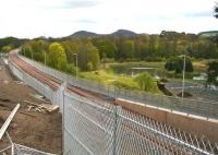 View south from the new road bridge carrying Winston Road, Galashiels, looking towards Tweedbank on 4 May 2015, with construction work essentially complete and a general clean-up well underway. [See image 46467]<br><br>[John Furnevel 04/05/2015]