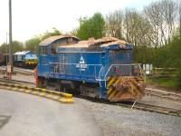 Aggregate Industries GM built Bo-Bo shunter <I>Western Yeoman II</I> runs back onto a rake of empty wagons at Merehead on 8 May 2015. Meantime another GM built loco 59005 stands at the end of a heavily loaded train ready to provide additional rear end power needed to  ensure it could ascend the gradient onto the branch from Witham Friary.<br><br>[David Pesterfield 08/05/2015]