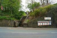 The main road is quite a way below the platforms at Kearsley with a few more than 39 steps to reach the platform. If you miss the notice that the station is closed until October then you could have a wasted journey as the rail replacement coach picks up alongside the road. It is also interesting that on 10 May 2015 the station sign still refers to 'British Rail'.<br><br>[John McIntyre 10/05/2015]