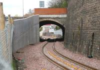 View north through Ladhope Tunnel, Galashiels, on 4 May 2015 showing the widening carried out to accomodate the Borders Railway. Part of the new pedestrian footbridge on Buckholmside is visible in the background.<br><br>[John Furnevel 04/05/2015]
