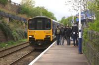 The first service to use the reinstated Todmorden Curve, the 2J61 0818 hrs Blackburn to Manchester Victoria, arrives at Burnley Manchester Road station on time on Sunday 17 May 2015. [See news item]<br><br>[John McIntyre 17/05/2015]