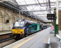 A gleaming 68002 <I>Intrepid</I> gets 'the off' with ECS from the morning Fife service, following arrival back at Waverley on 18 May 2015. It had been routed into Platform 11 on this occasion rather than the usual Platform 2.<br>
<br><br>[David Panton 18/05/2015]