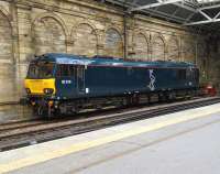92018 in the simple and elegant Caledonian Sleeper livery stabled in the siding opposite Platform 7 at Edinburgh Waverley on 18 May 2015.<br><br>[David Panton 18/05/2015]