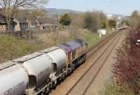 A cement empties train from Avonmouth to the Castle Cement plant at Horrocksford approaches Clitheroe station behind DBS 66023. The cement plant is less than a mile beyond here and the loco will run round at Horrocksford Junction before propelling the wagons along the short branch into the terminal. <br><br>[Mark Bartlett 18/04/2015]
