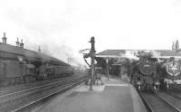 A busy Wednesday evening at Kilmarnock station on 29 July 1953. Locomotives from left to right are 40667 (Ardrossan), 40689 (Hurlford), 42190 (Corkerhill) and 40664 (Ayr).     <br><br>[G H Robin collection by courtesy of the Mitchell Library, Glasgow 29/07/1953]