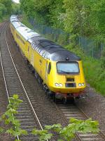 A Network Rail Measurement Train climbs away from Dalgety Bay on a return trip from Edinburgh to Aberdeen on 2 June.<br><br>[Bill Roberton 02/06/2015]