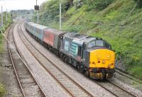 DRS EE Type 3 37402 leads the 0515 Carlisle to Preston (via Barrow) service through Hest Bank on 5th June 2015. 37609 was bringing up the rear on this leg of the diagram. <br><br>[Mark Bartlett 05/06/2015]